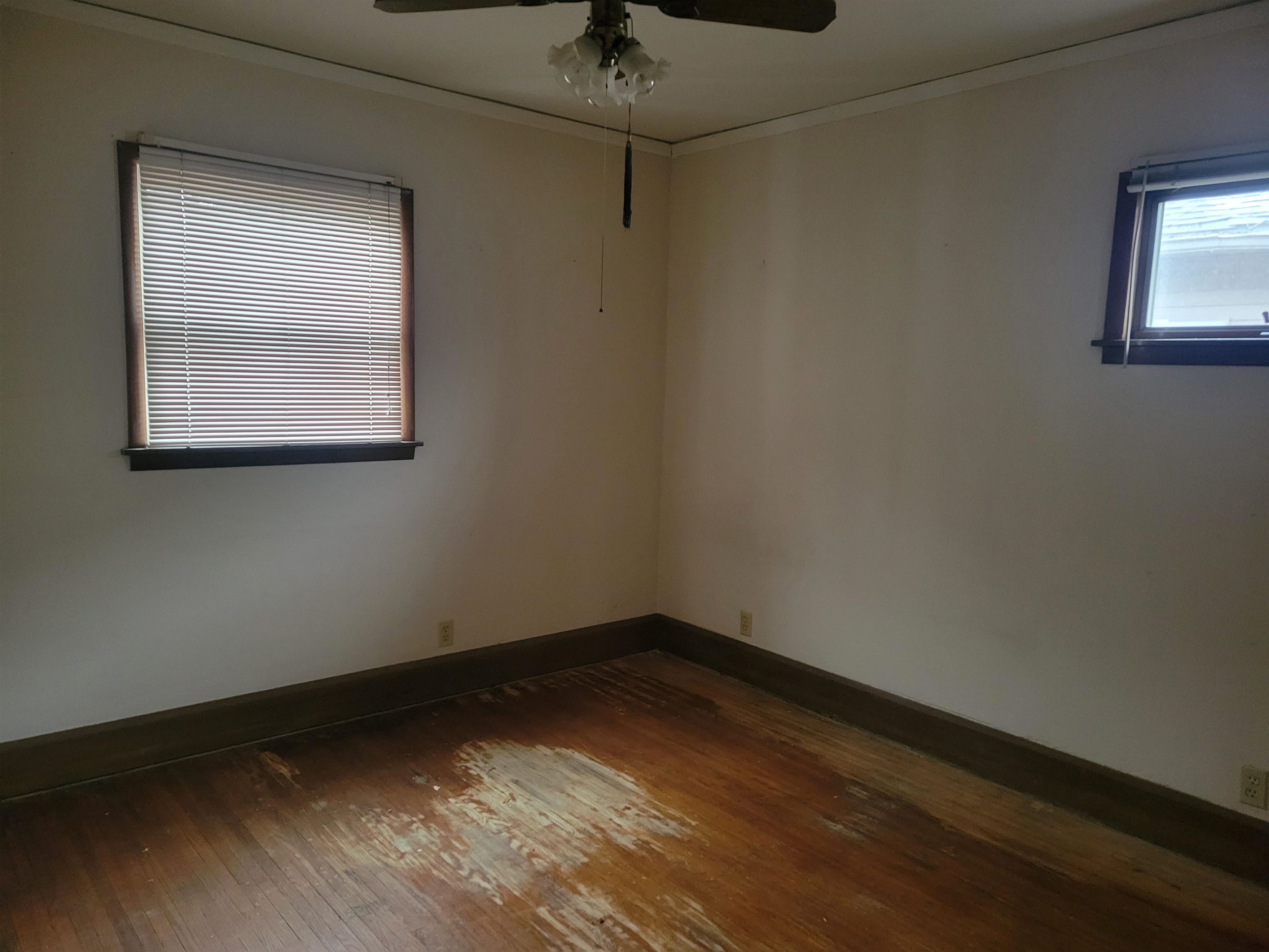 1908 Rural Street Rockford, IL 61107 - Photo 11 of 19 a view of a small space with wooden floor and a window