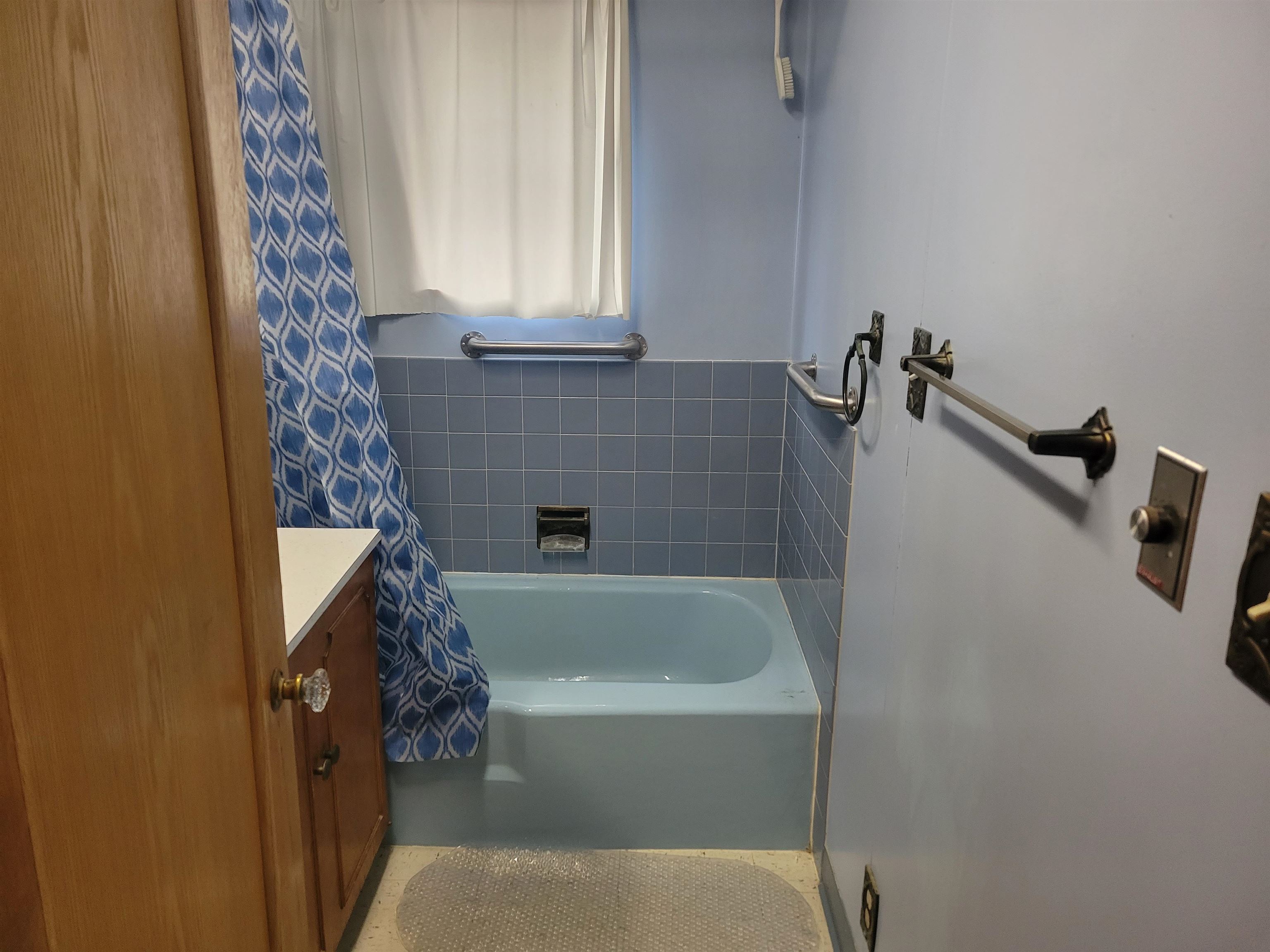 1908 Rural Street Rockford, IL 61107 - Photo 12 of 19 a bathroom with a tub and shower