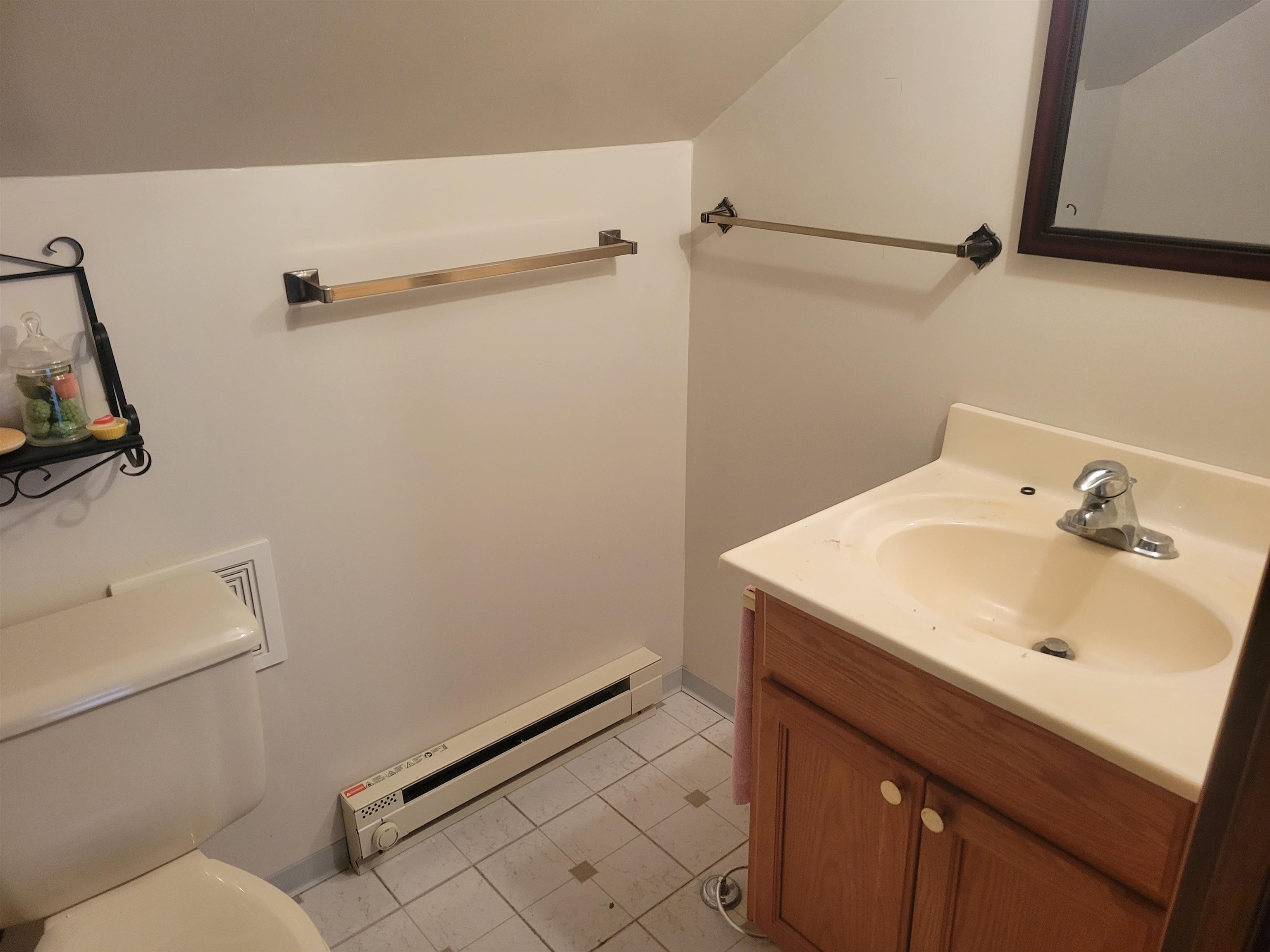1908 Rural Street Rockford, IL 61107 - Photo 16 of 19 a bathroom with a sink and a toilet