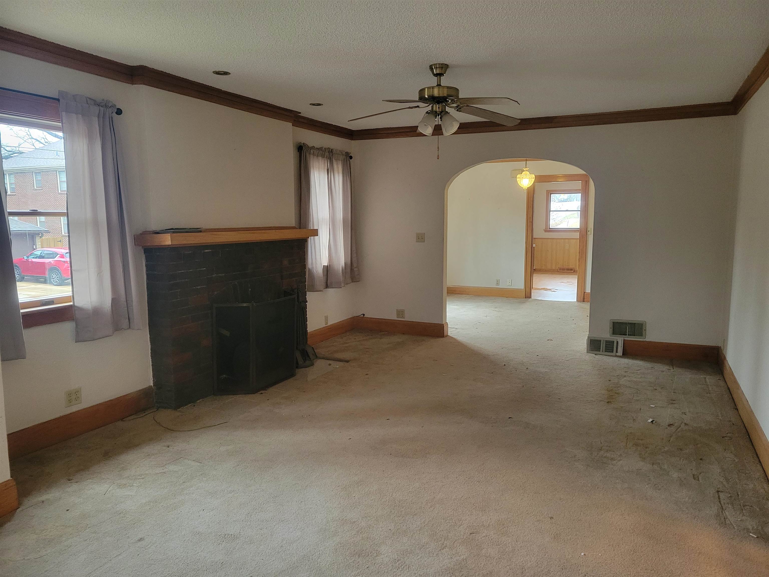1908 Rural Street Rockford, IL 61107 - Photo 3 of 19 a view of a livingroom with a staircase