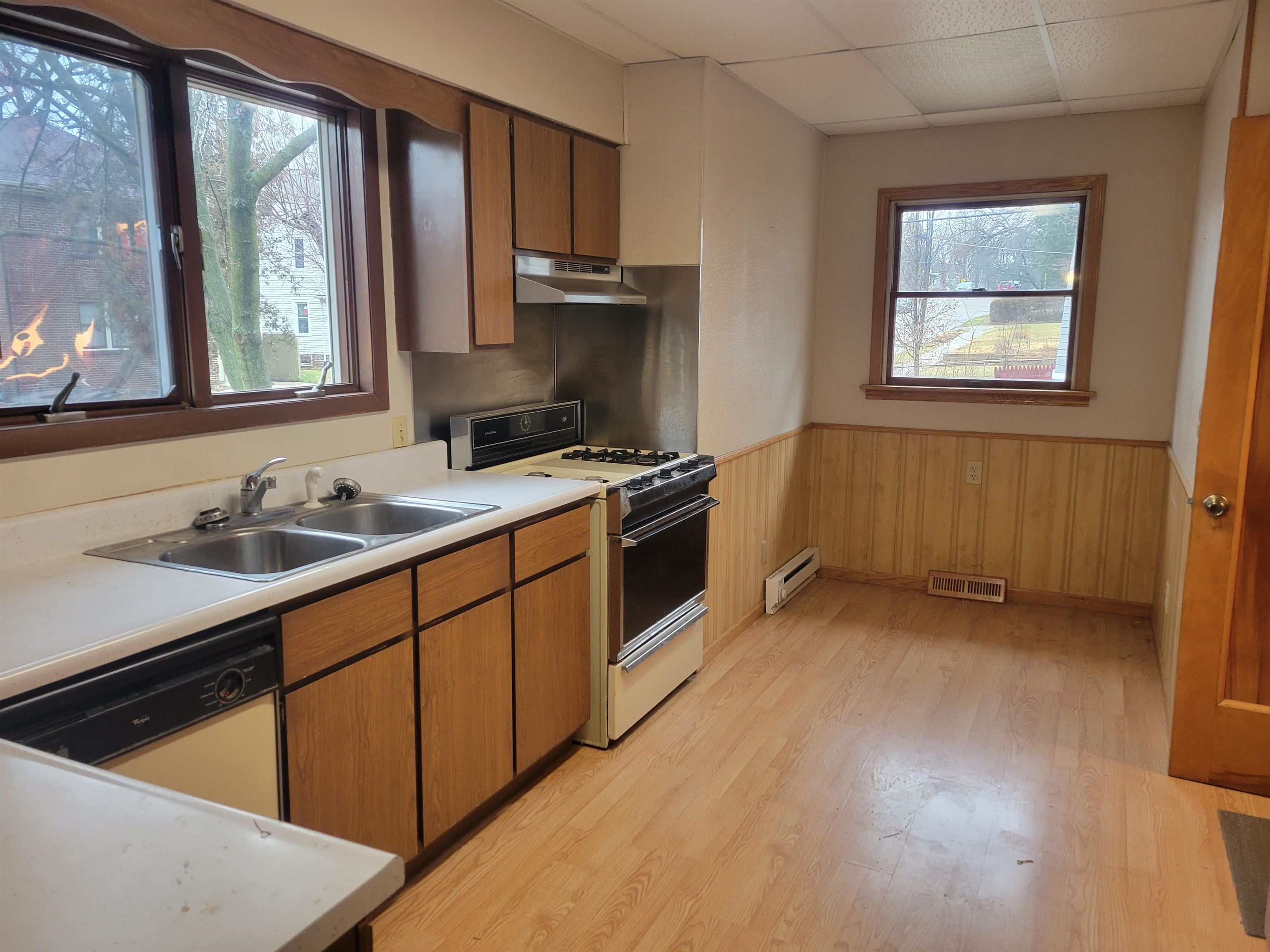 1908 Rural Street Rockford, IL 61107 - Photo 8 of 19 a kitchen with a sink stove and microwave