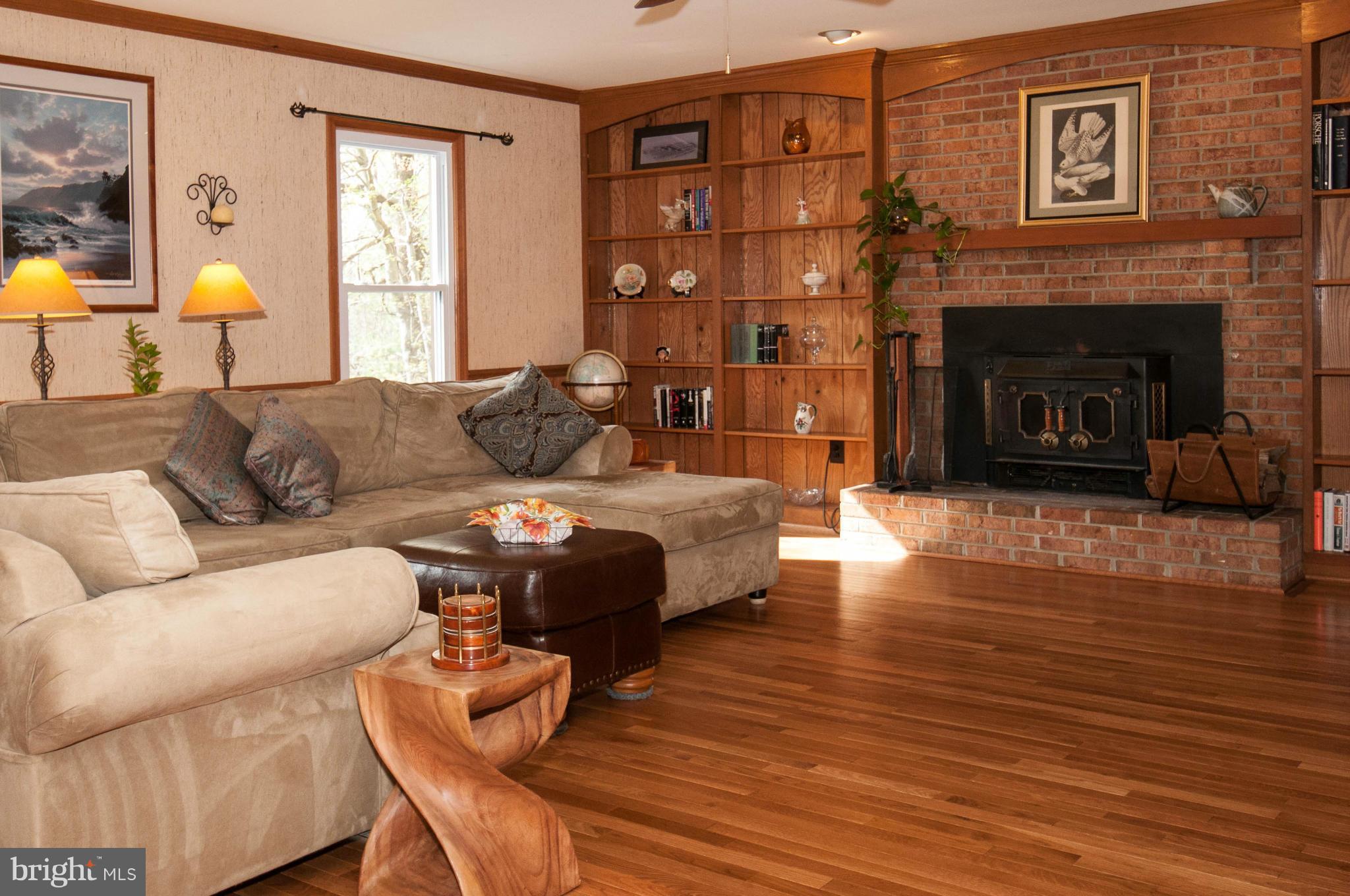 11662 Havenner Road Fairfax Station, VA 22039 - Photo 11 of 30 a living room with furniture and a fireplace