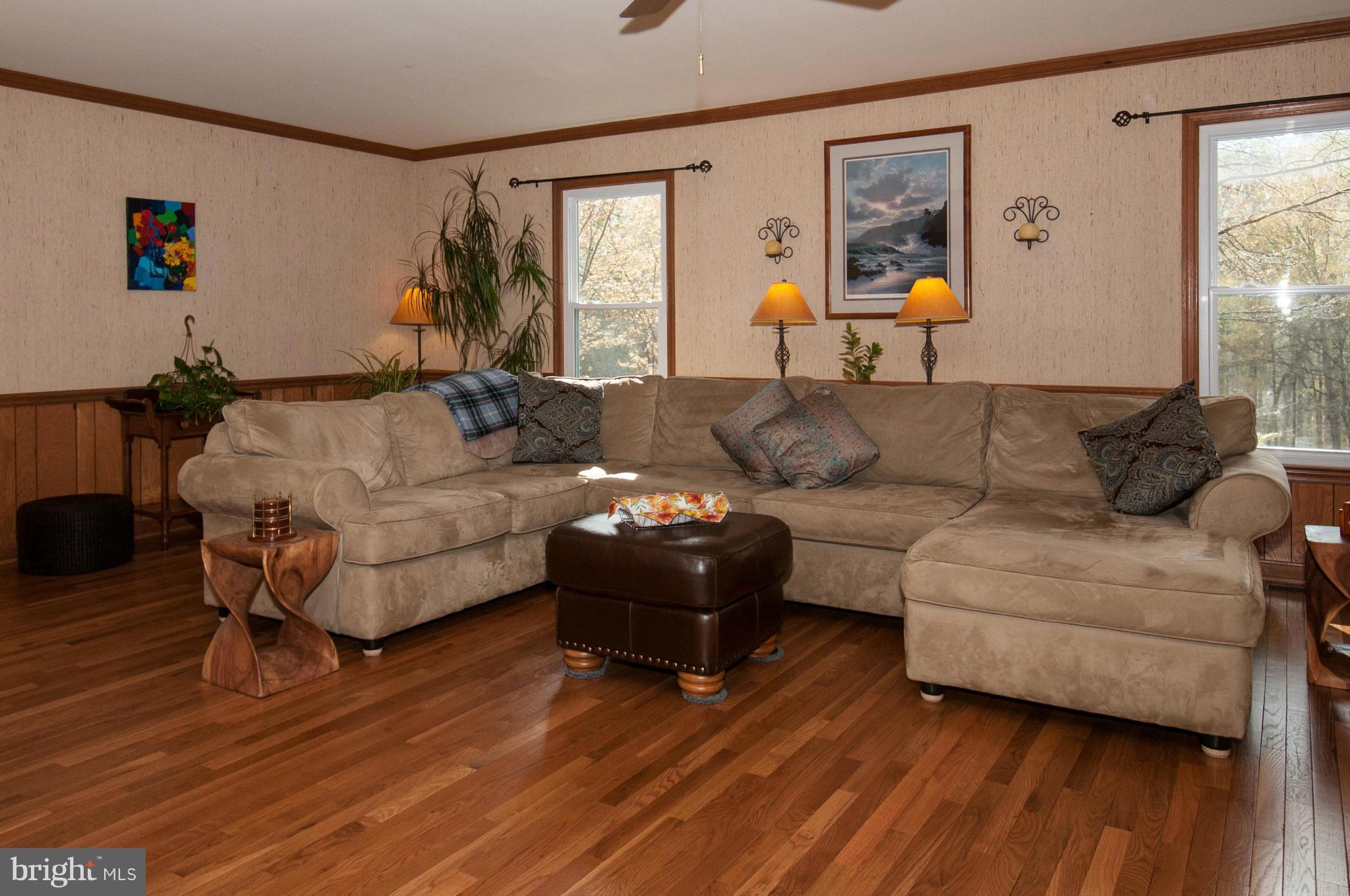11662 Havenner Road Fairfax Station, VA 22039 - Photo 12 of 30 a living room with furniture and wooden floor