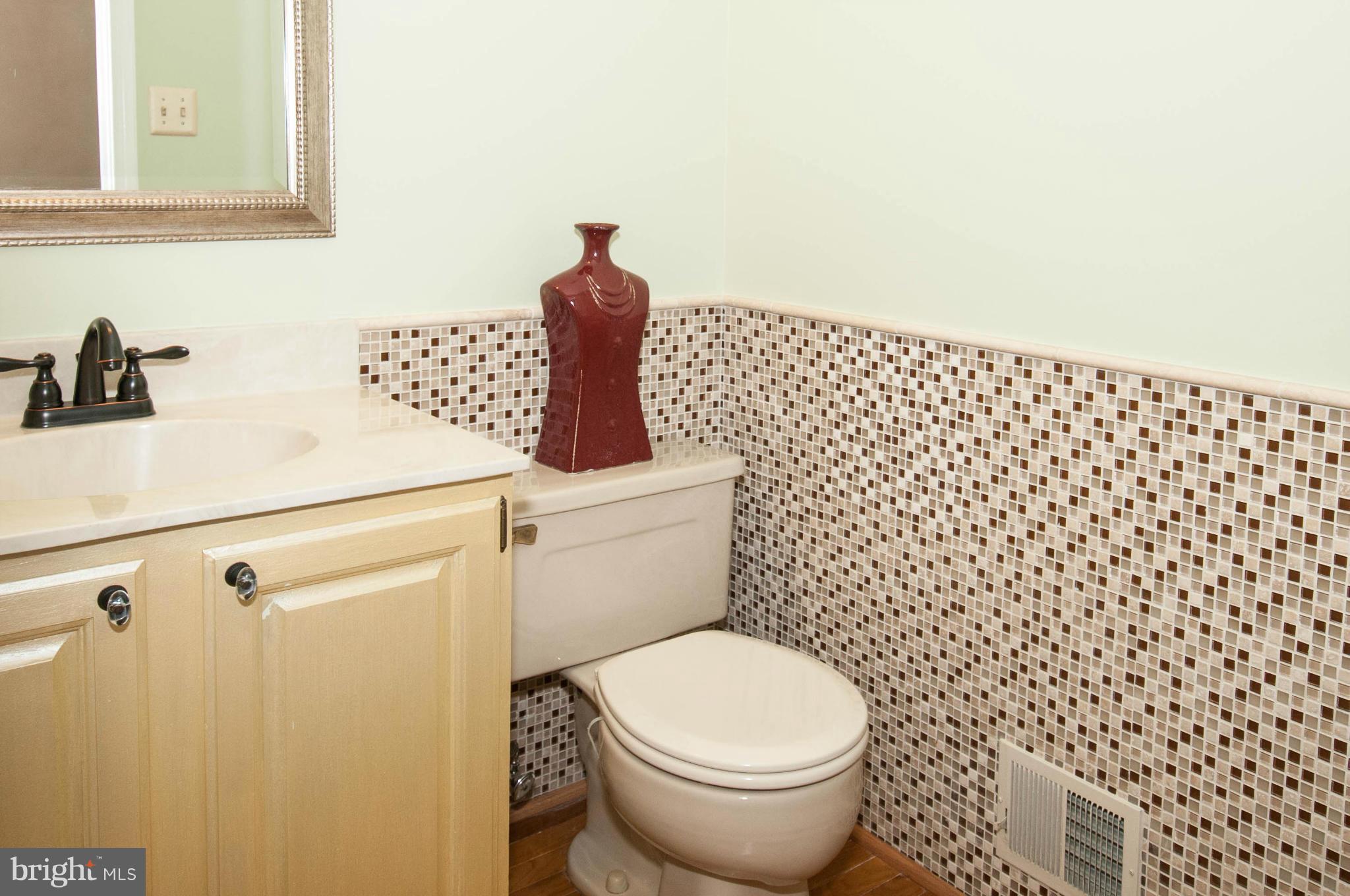 11662 Havenner Road Fairfax Station, VA 22039 - Photo 13 of 30 a bathroom with a toilet and a sink