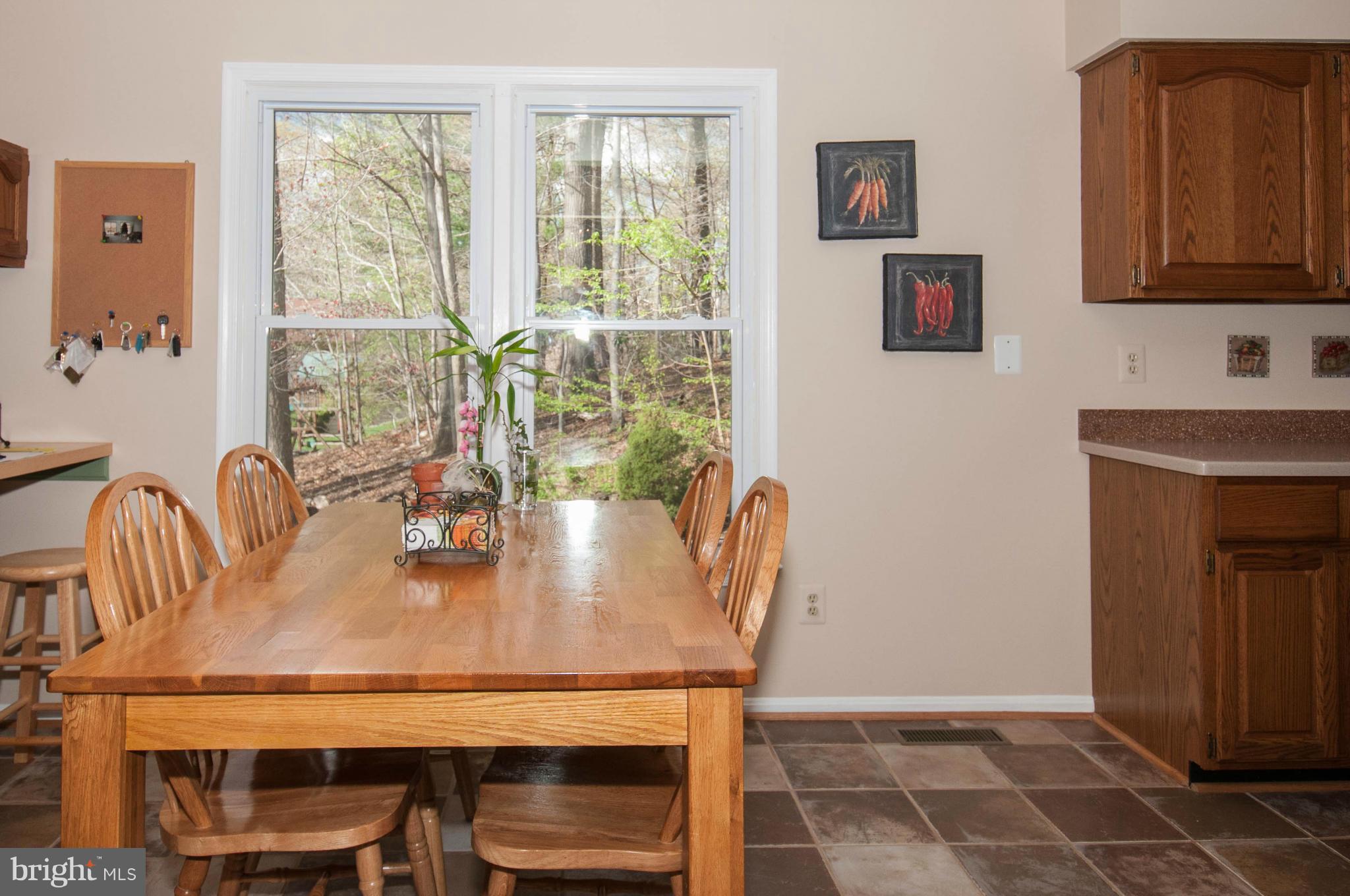 11662 Havenner Road Fairfax Station, VA 22039 - Photo 14 of 30 a dining room with furniture and window