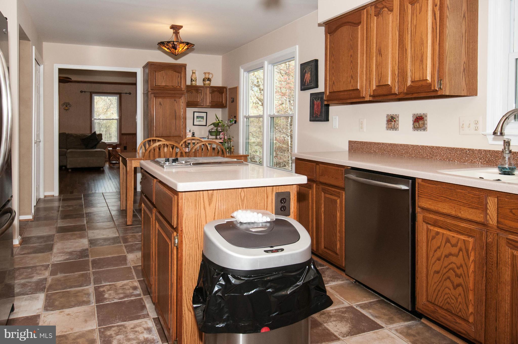11662 Havenner Road Fairfax Station, VA 22039 - Photo 17 of 30 a kitchen with a sink and cabinets