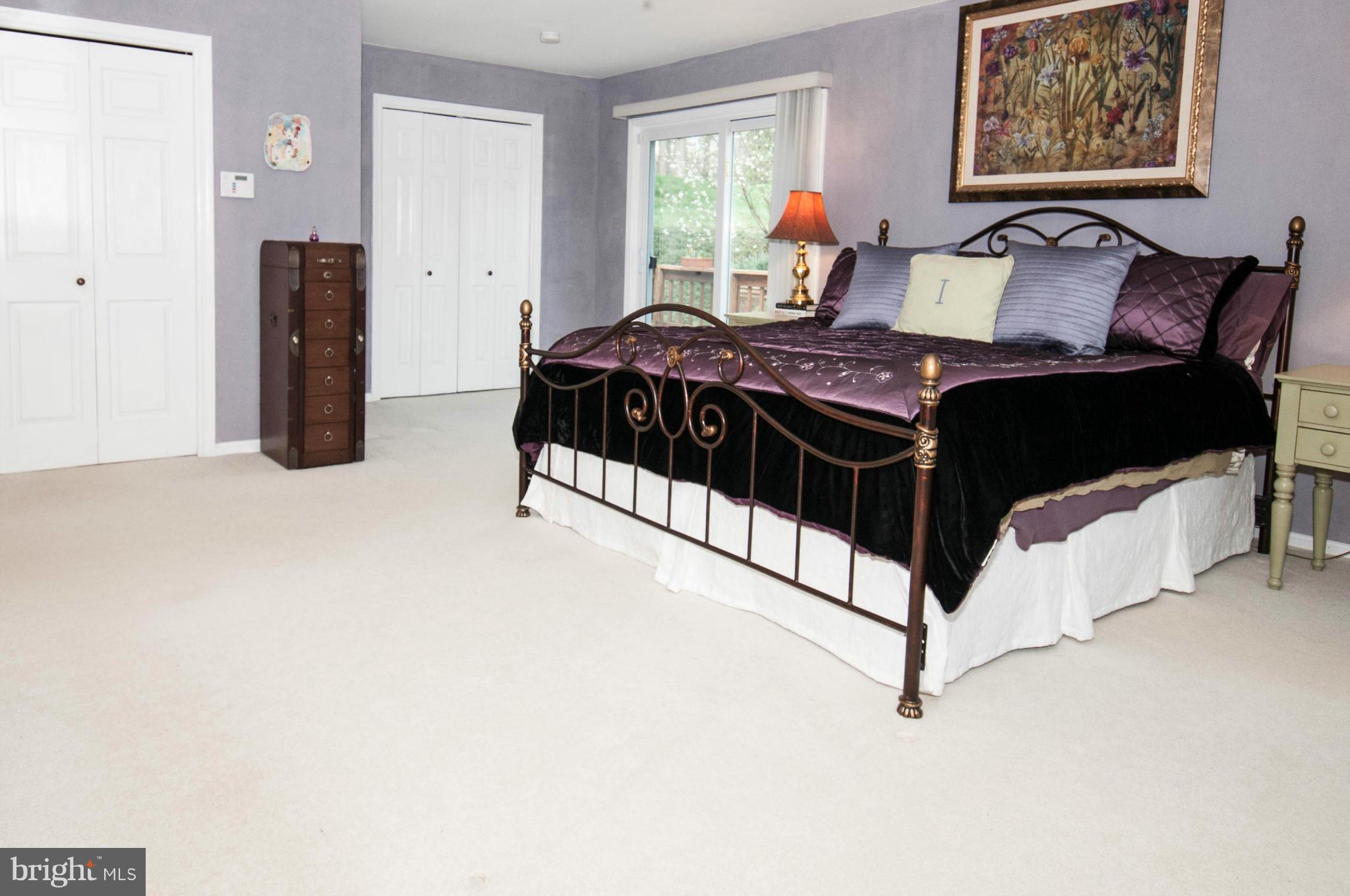 11662 Havenner Road Fairfax Station, VA 22039 - Photo 20 of 30 a bedroom with a bed and a window