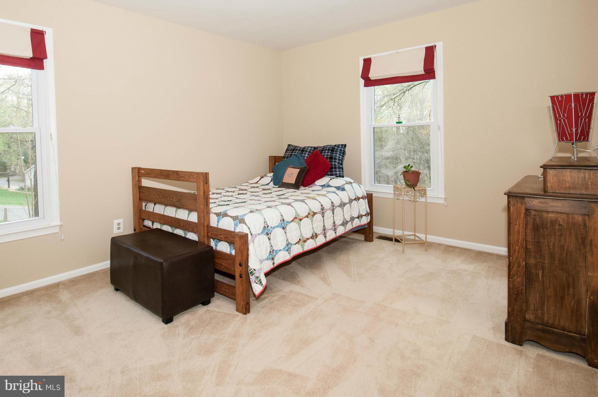 11662 Havenner Road Fairfax Station, VA 22039 - Photo 23 of 30 a bedroom with a bed and a window