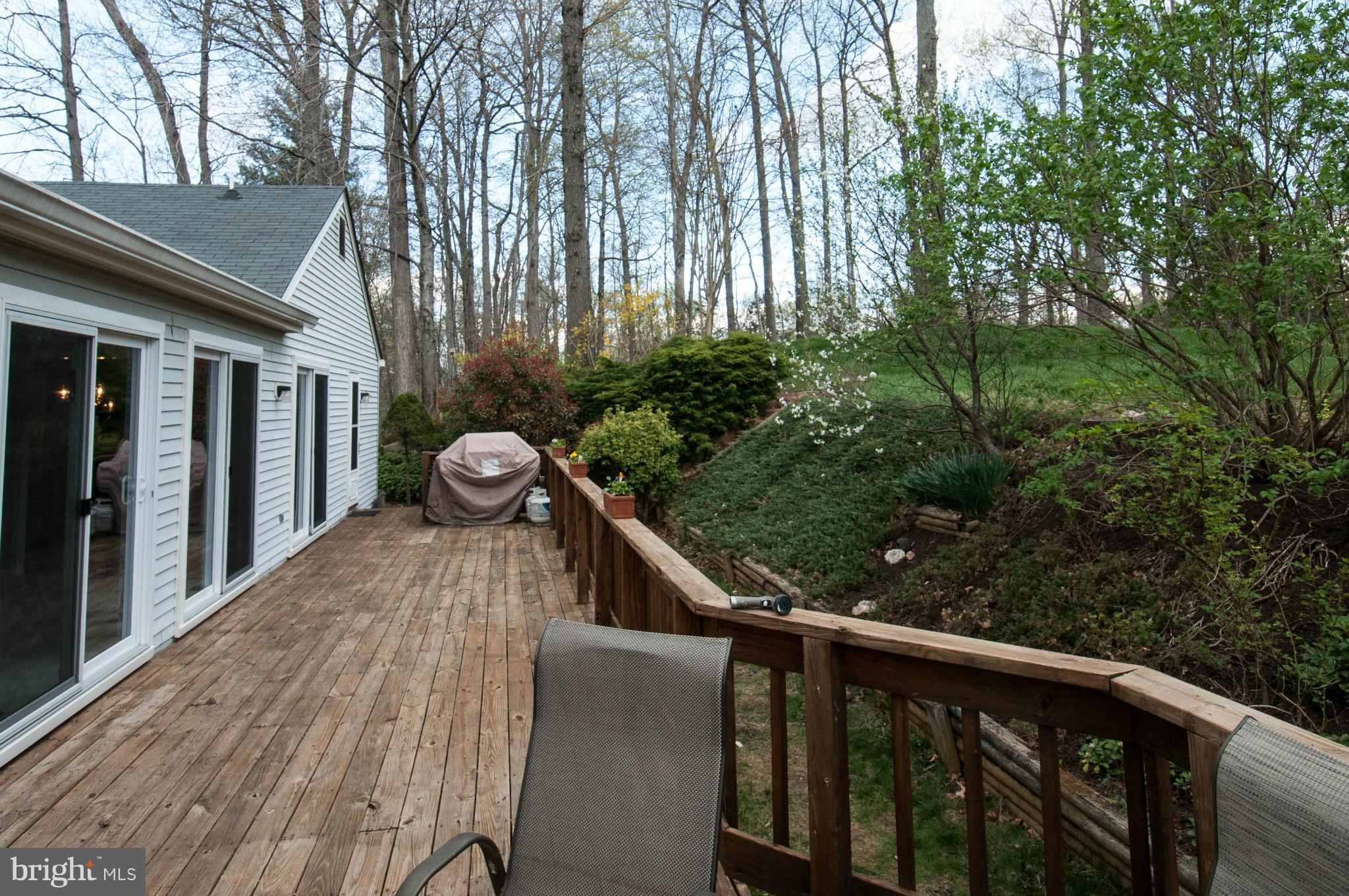 11662 Havenner Road Fairfax Station, VA 22039 - Photo 29 of 30 a view of a wooden deck and a yard