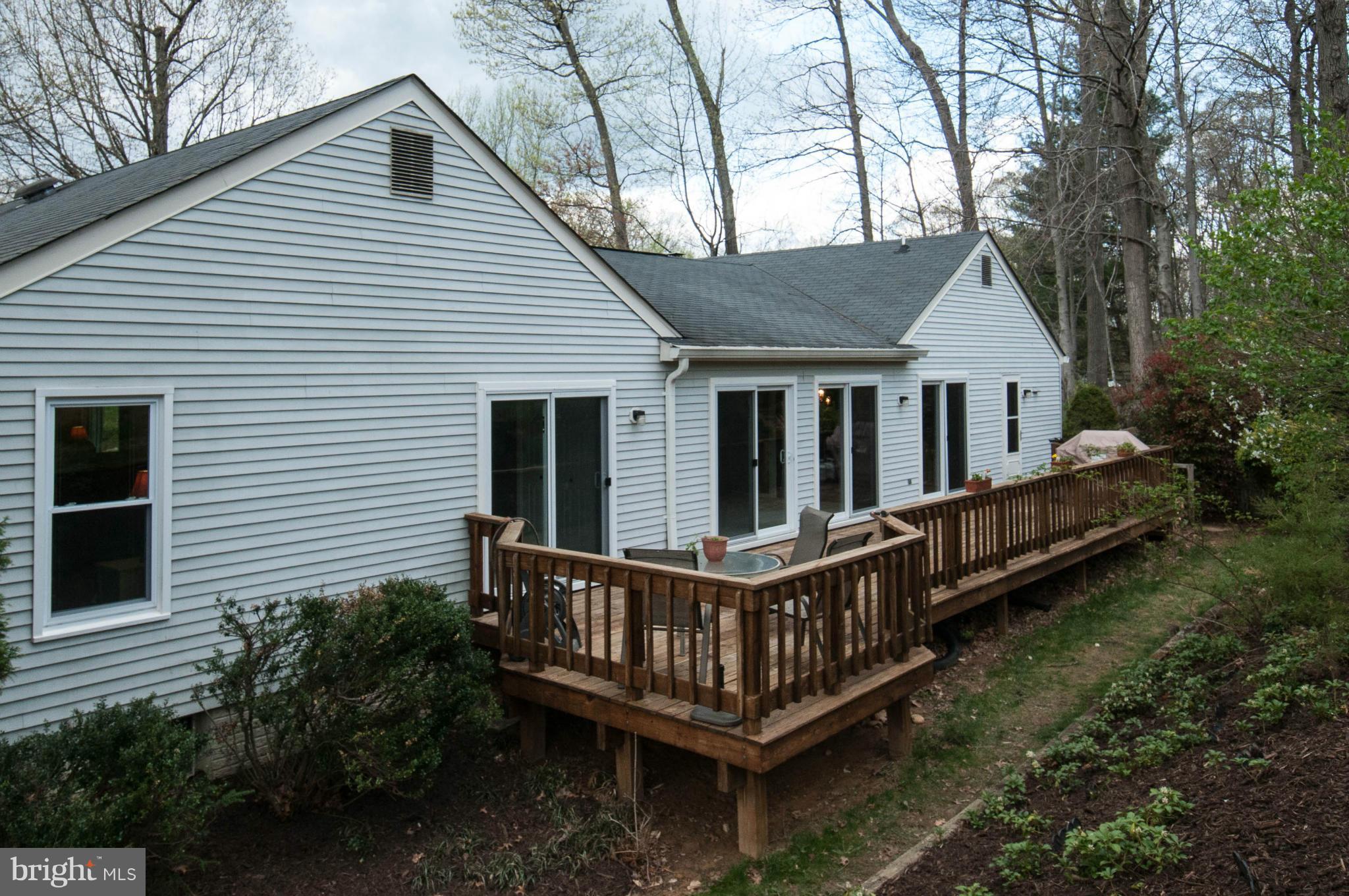 11662 Havenner Road Fairfax Station, VA 22039 - Photo 30 of 30 a view of a house with a roof deck