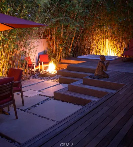 a view of a deck with furniture