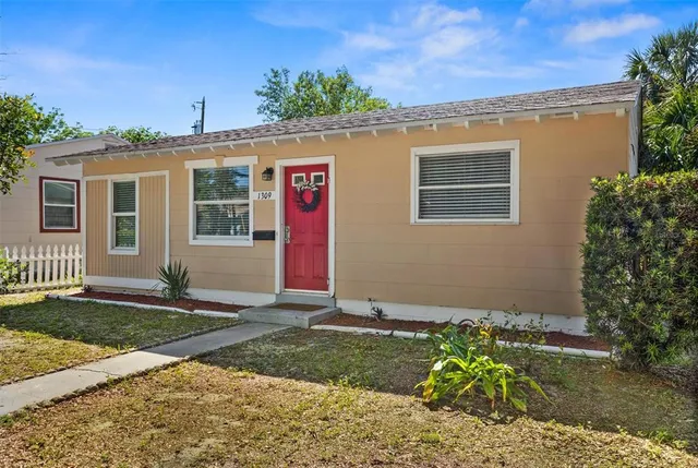 front view of a house with a yard