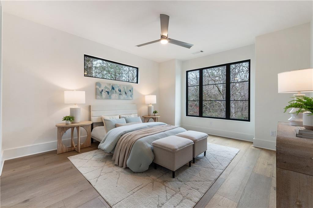 388 Londonberry Road Northwest Sandy Springs, GA 30327 - Photo 51 of 84 a bedroom with a large bed and a window