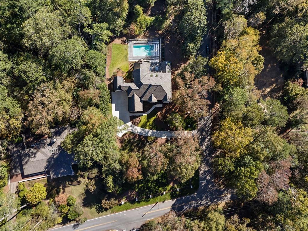 388 Londonberry Road Northwest Sandy Springs, GA 30327 - Photo 68 of 84 an aerial view of a house with a yard and garden