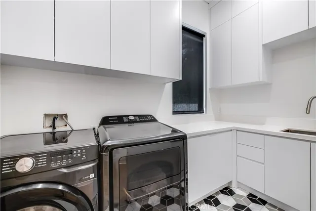 a kitchen with a stove and a sink