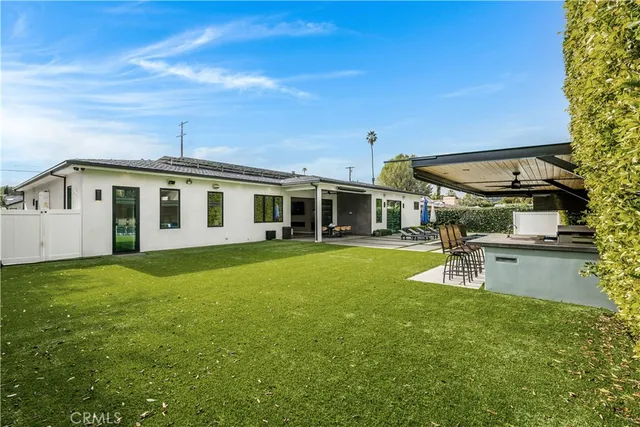 a front view of house with yard and porch