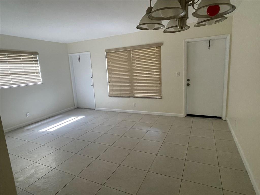 1012 Southeast 15th Street, Unit 5 Fort Lauderdale, FL 33316 - Photo 2 of 9 a view of an empty room with a window