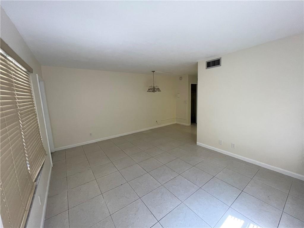 1012 Southeast 15th Street, Unit 5 Fort Lauderdale, FL 33316 - Photo 4 of 9 an empty room with a empty space