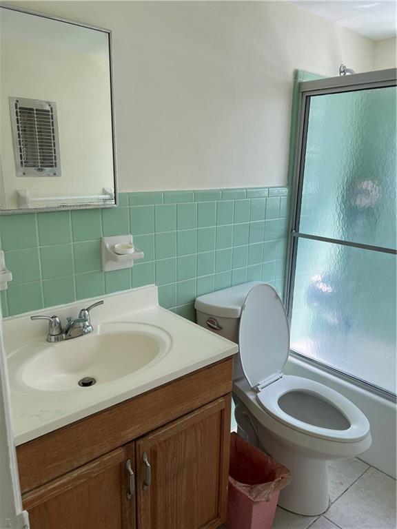 1012 Southeast 15th Street, Unit 5 Fort Lauderdale, FL 33316 - Photo 7 of 9 a bathroom with a sink mirror toilet and bathroom