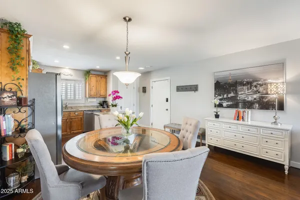 a living room with furniture and a table
