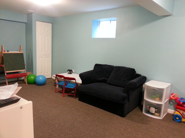 609 Homeland Road Matteson, IL 60443 - Photo 14 of 18 a living room with furniture a flat screen tv and a window
