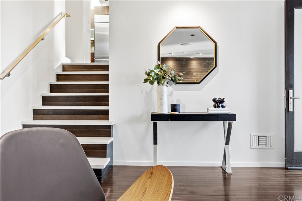 970 Baja Street Laguna Beach, CA 92651 - Photo 16 of 27 a living room with furniture and a mirror
