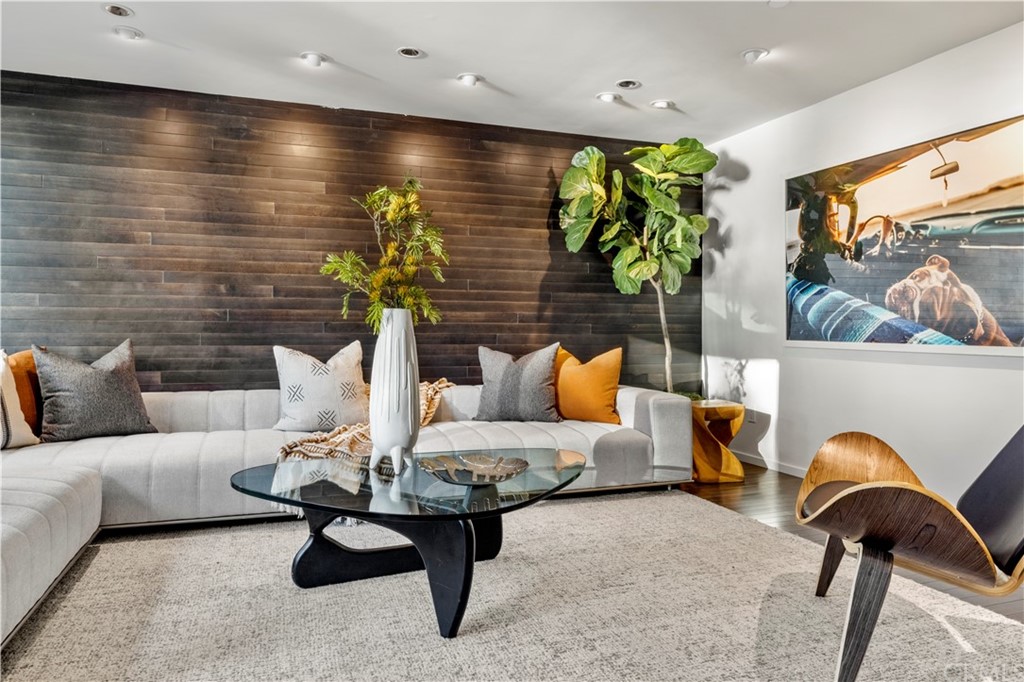 970 Baja Street Laguna Beach, CA 92651 - Photo 17 of 27 a living room with furniture and a potted plant