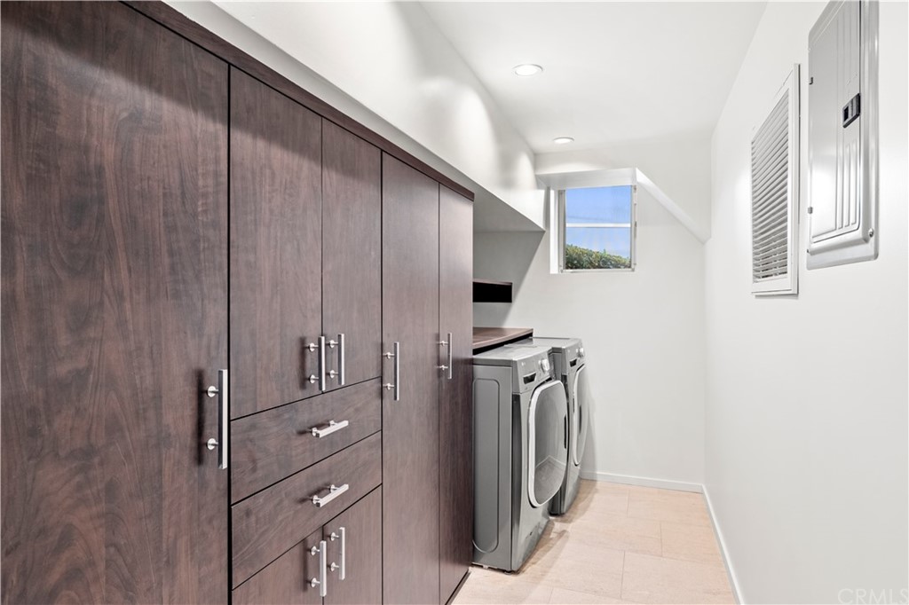 970 Baja Street Laguna Beach, CA 92651 - Photo 21 of 27 a view of a hallway with washer and dryer