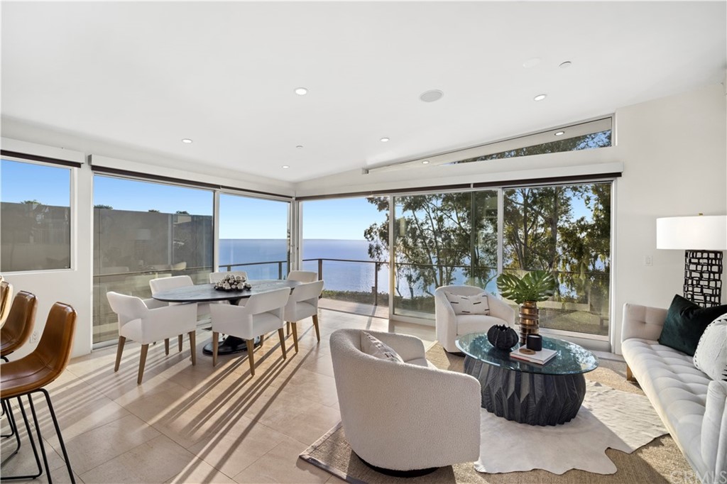970 Baja Street Laguna Beach, CA 92651 - Photo 4 of 27 a living room with furniture and a large window