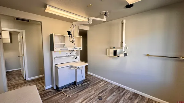 a kitchen with a refrigerator and countertop