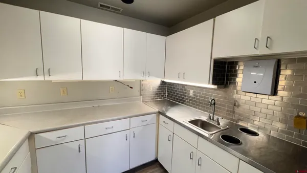 a room with storage and utility