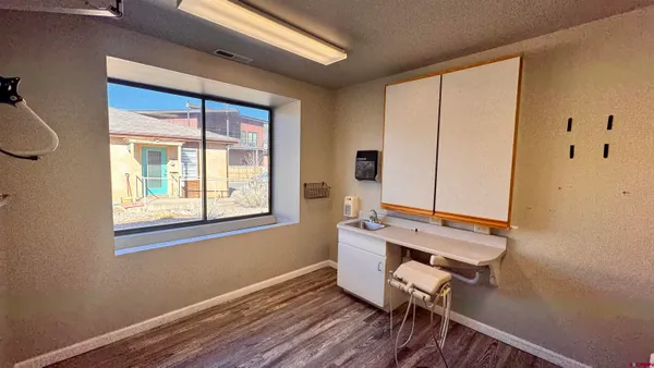 a bathroom with a sink and mirror