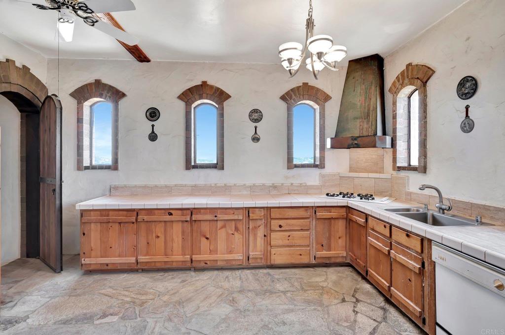 19105 Laminack Lane Jamul, CA 91935 - Photo 15 of 27 a spacious bathroom with a double vanity sink and a mirror