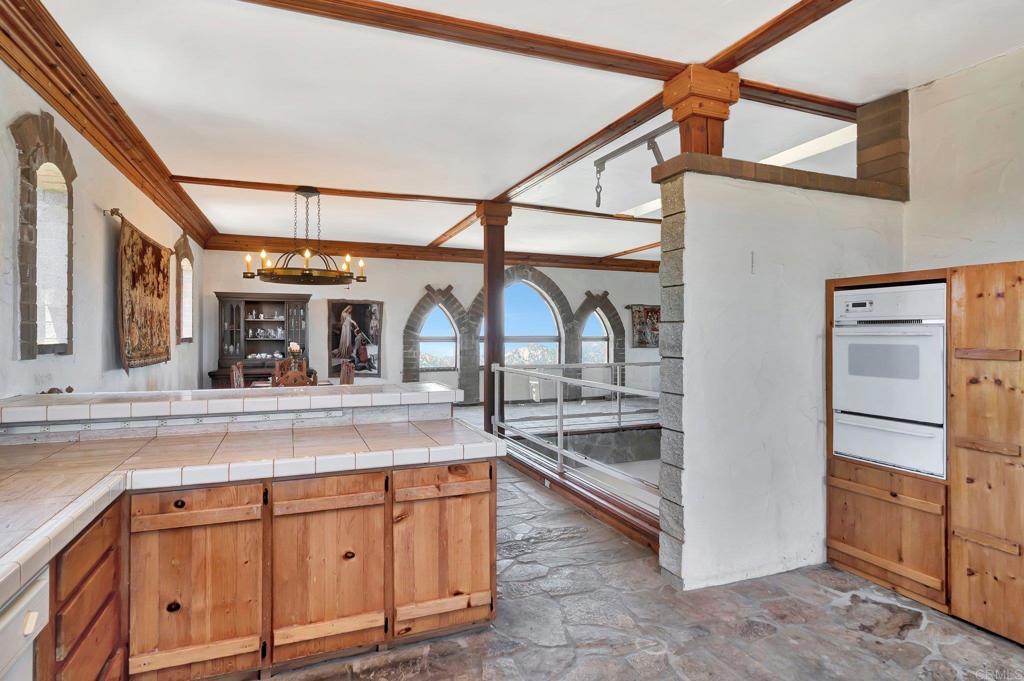 19105 Laminack Lane Jamul, CA 91935 - Photo 16 of 27 a kitchen with sink and cabinets