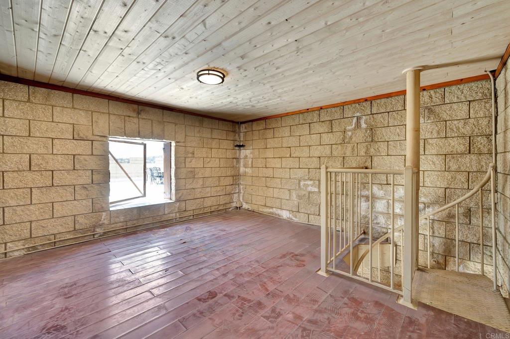 19105 Laminack Lane Jamul, CA 91935 - Photo 23 of 27 a view of an empty room with a window