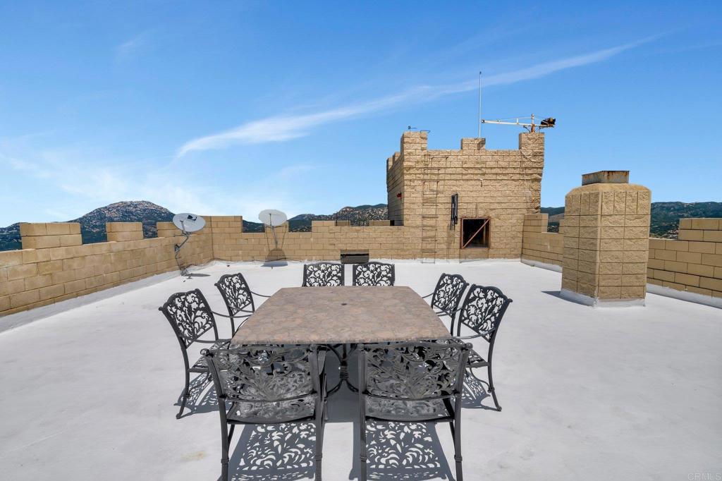 19105 Laminack Lane Jamul, CA 91935 - Photo 25 of 27 a view of dinning table and chairs in the patio