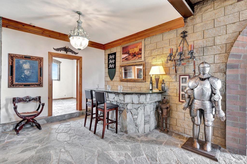 19105 Laminack Lane Jamul, CA 91935 - Photo 8 of 27 a view of hall way with furniture and chandelier