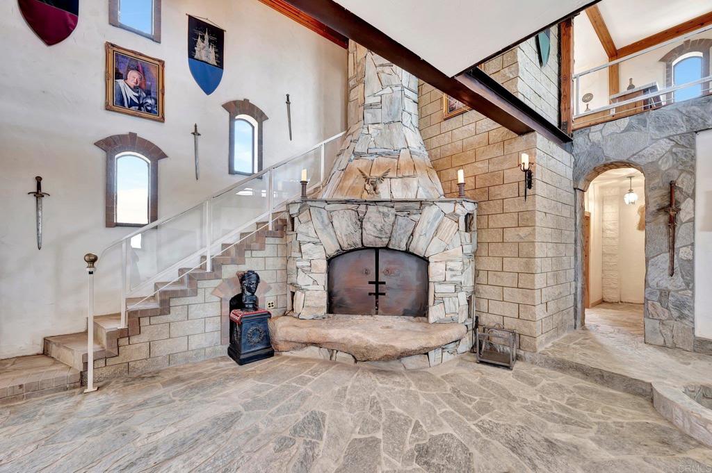 19105 Laminack Lane Jamul, CA 91935 - Photo 9 of 27 a view of a livingroom with fireplace and furniture