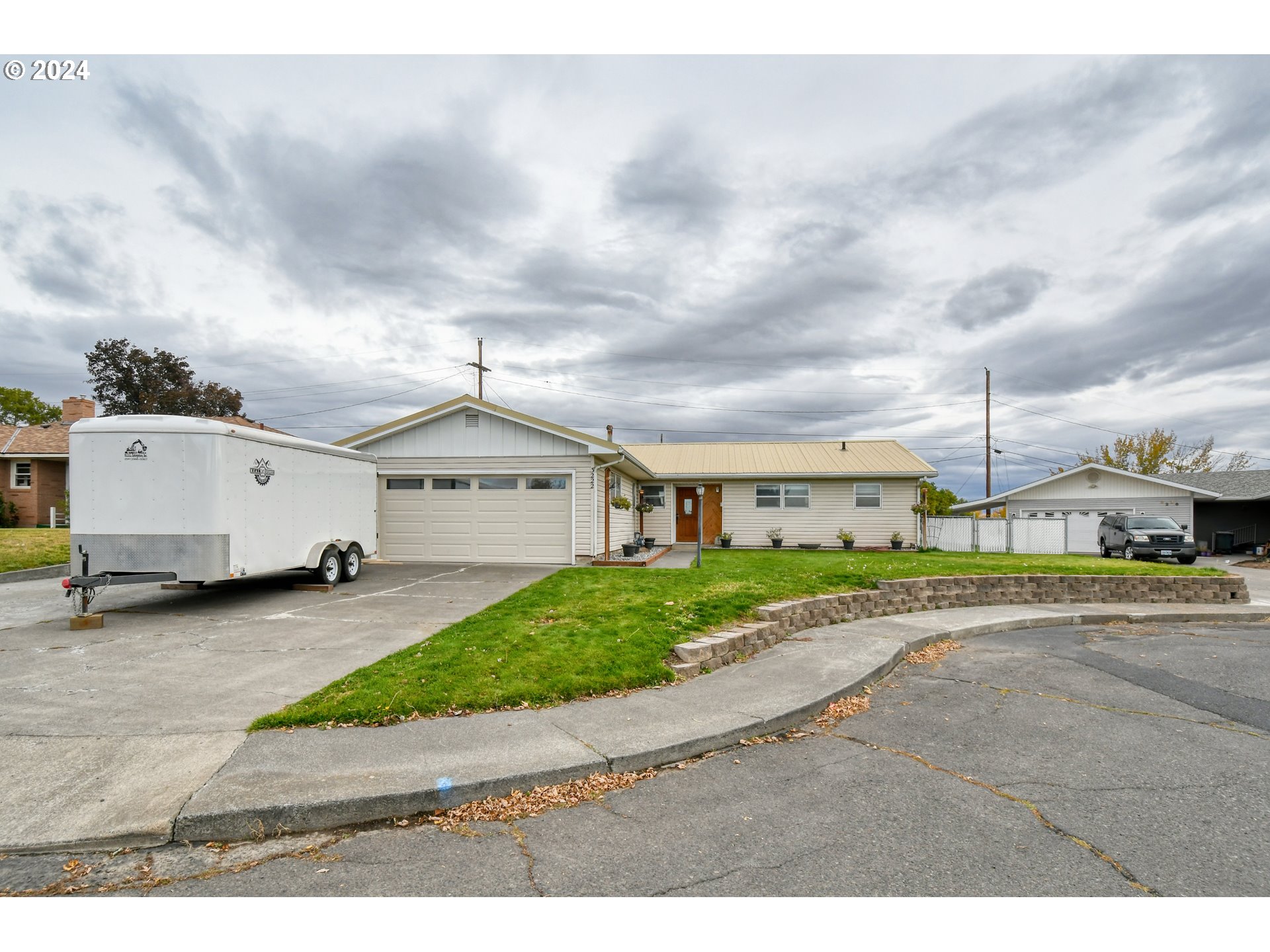 3222 Southwest Hailey Place Pendleton, OR 97801 - Photo 1 of 48 a view of a house with a yard and fence