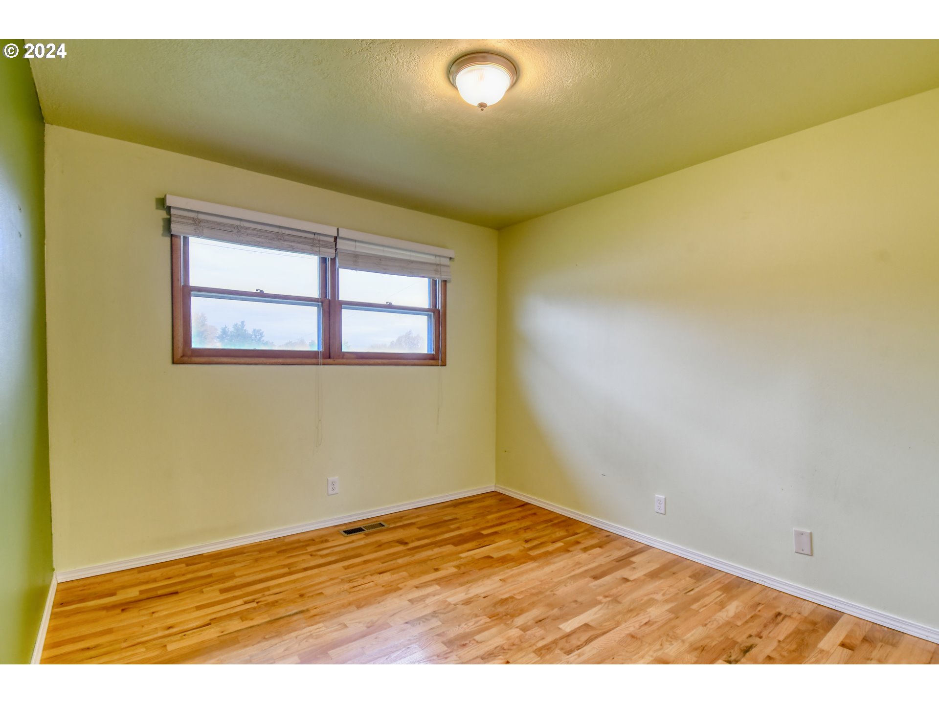 3222 Southwest Hailey Place Pendleton, OR 97801 - Photo 35 of 48 a view of empty room with wooden floor