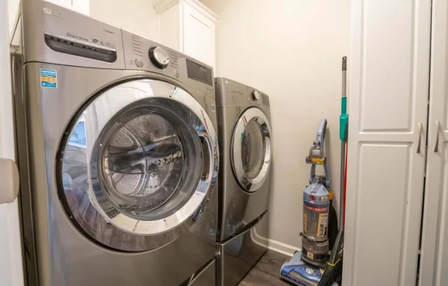 a utility room with dryer and washer