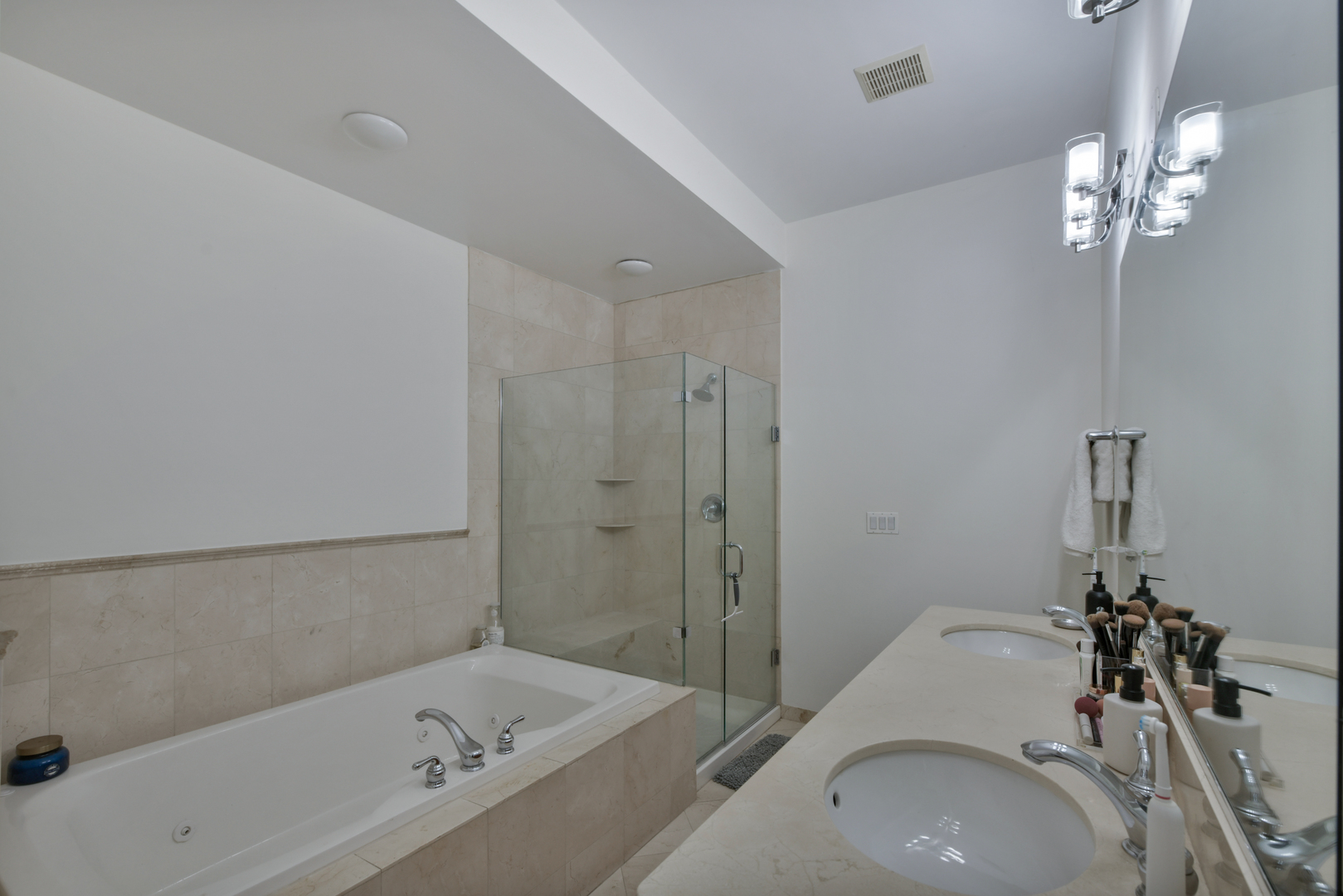 1355 West Washington Boulevard, Unit 2B Chicago, IL 60607 - Photo 11 of 16 a bathroom with a sink a toilet and shower