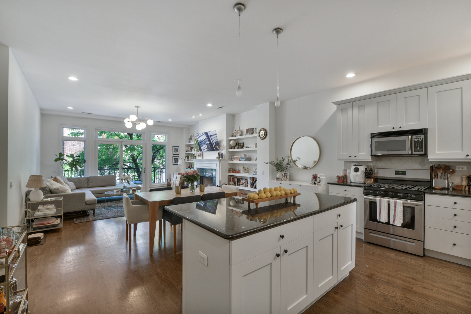 1355 West Washington Boulevard, Unit 2B Chicago, IL 60607 - Photo 3 of 16 a kitchen with sink stove and cabinets
