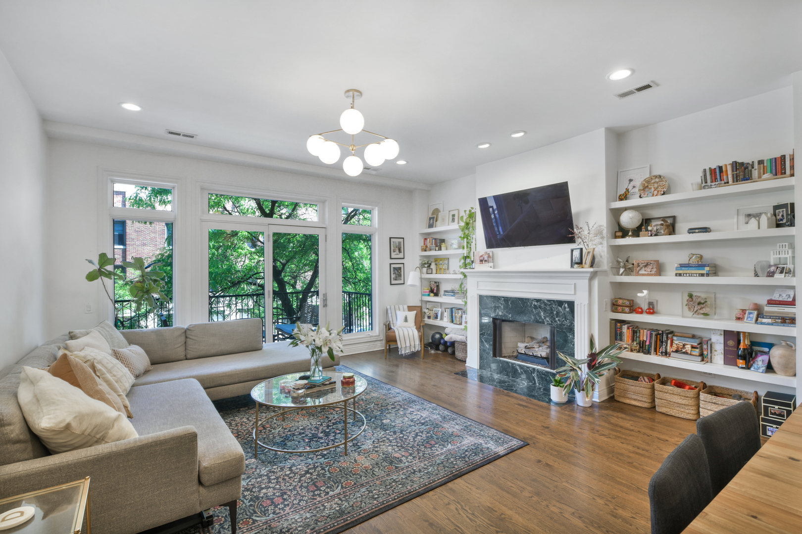 1355 West Washington Boulevard, Unit 2B Chicago, IL 60607 - Photo 6 of 16 a living room with furniture fireplace and flat screen tv