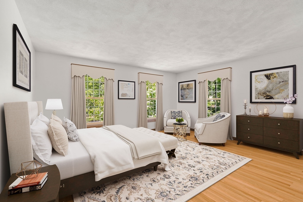 16 Parmenter Road Framingham, MA 01701 - Photo 17 of 34 a bedroom with a large bed and a dresser