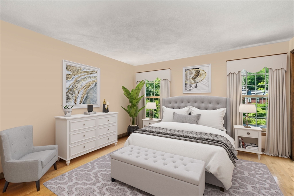 16 Parmenter Road Framingham, MA 01701 - Photo 18 of 34 a bed room with a bed and a couch