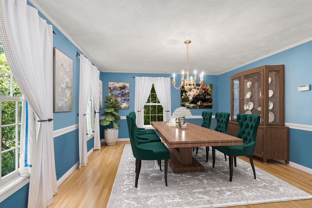 16 Parmenter Road Framingham, MA 01701 - Photo 5 of 34 a view of a dining room with furniture window and wooden floor