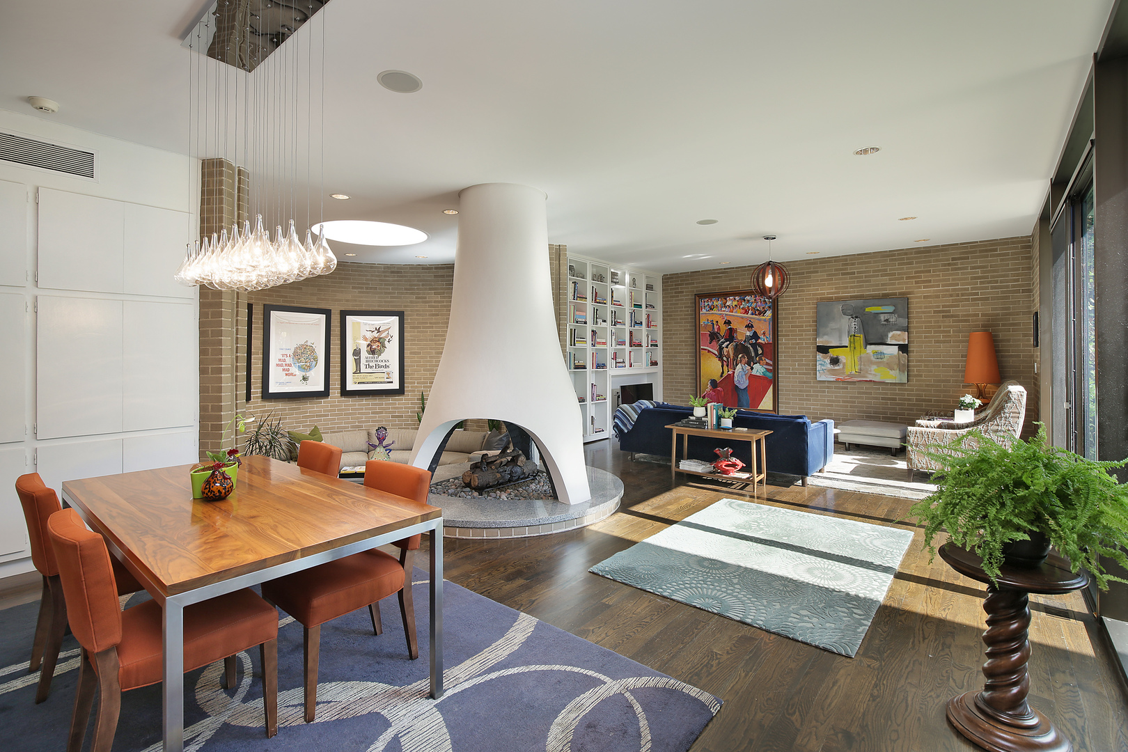 643 Sheridan Road Evanston, IL 60202 - Photo 12 of 29 a living room with furniture a chandelier and a table