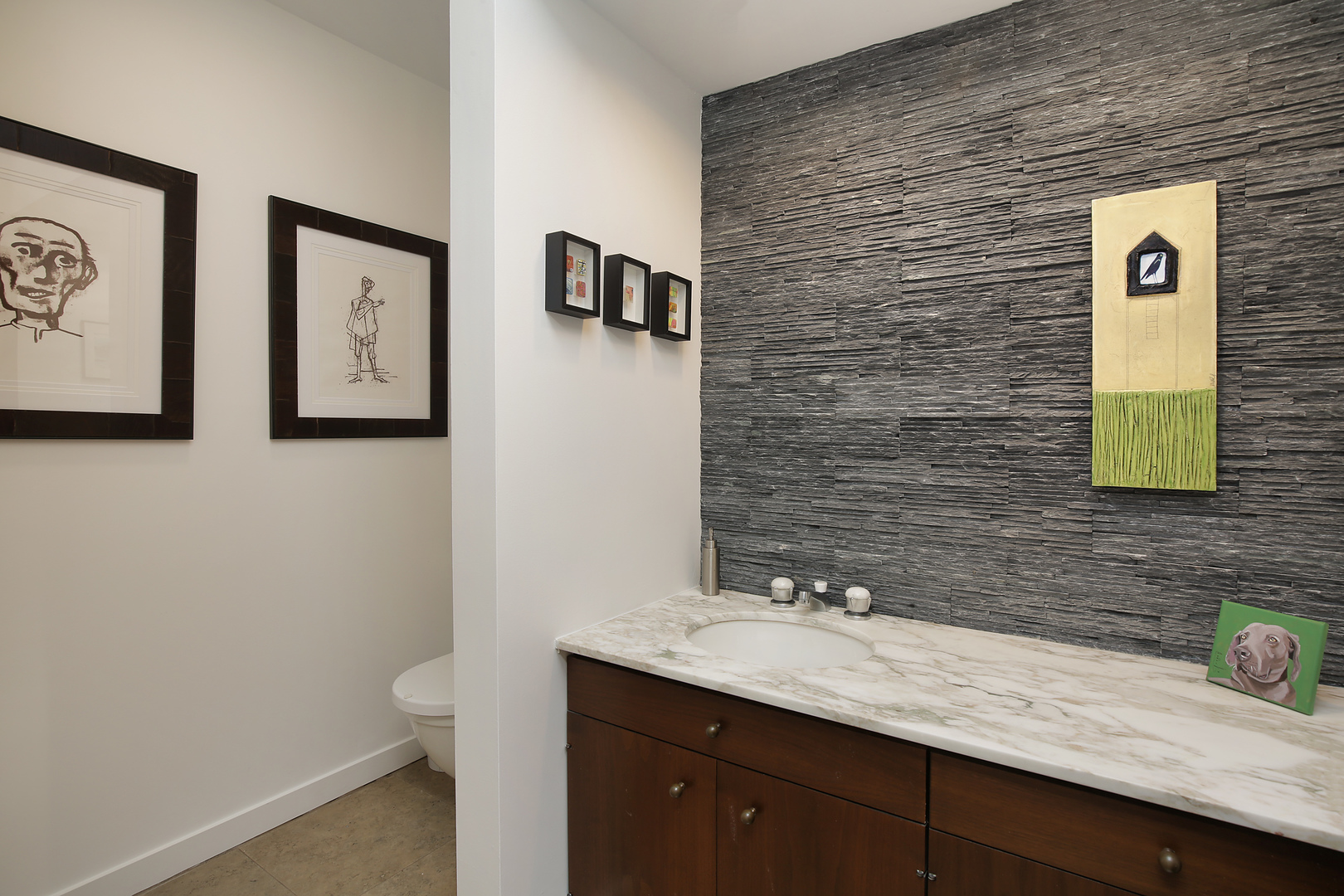 643 Sheridan Road Evanston, IL 60202 - Photo 23 of 29 a bathroom with a granite countertop sink and a mirror