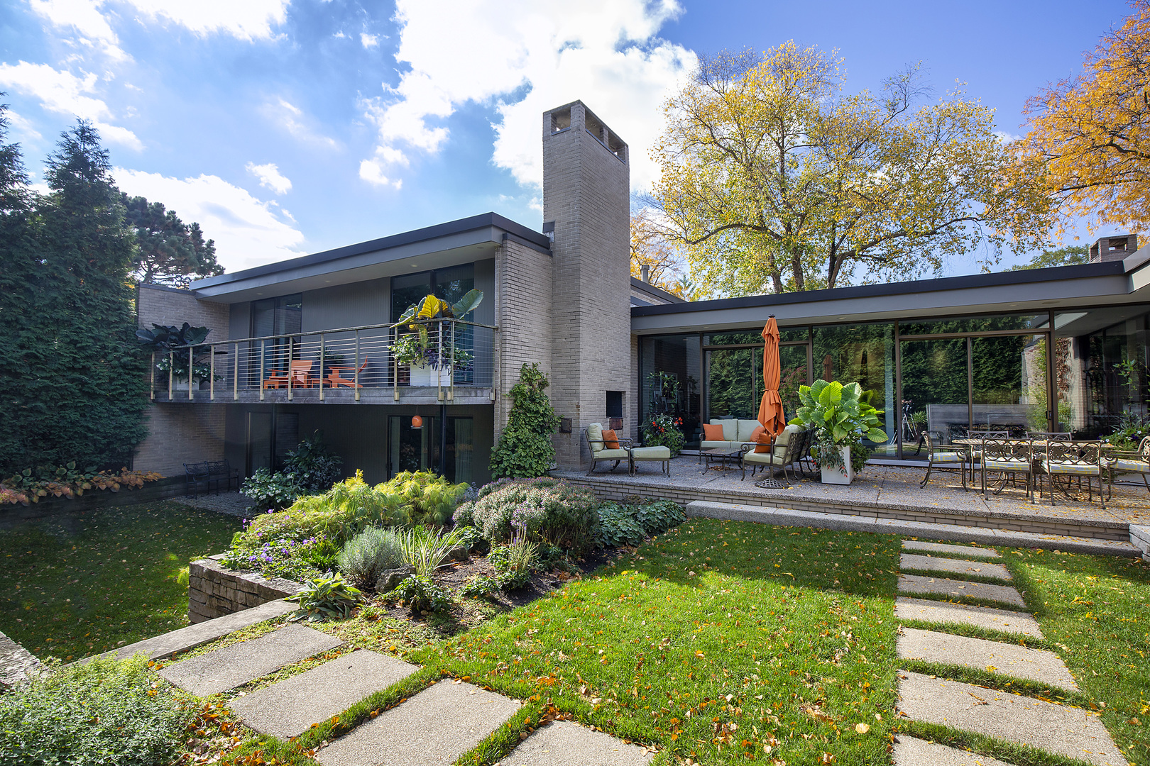 643 Sheridan Road Evanston, IL 60202 - Photo 28 of 29 a view of a house with backyard porch and sitting area